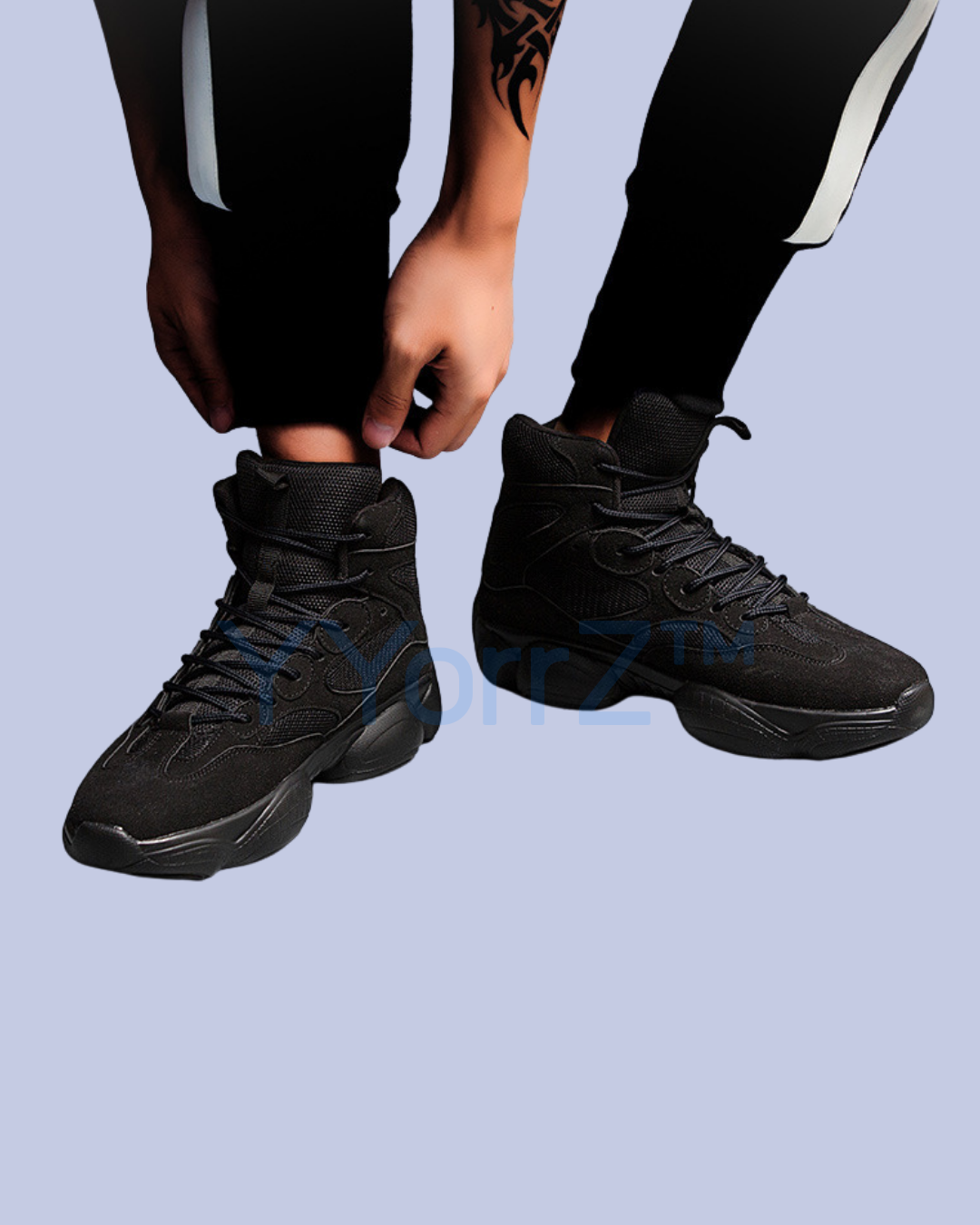 A model with the black Urban Streetwear High-Top Sneakers