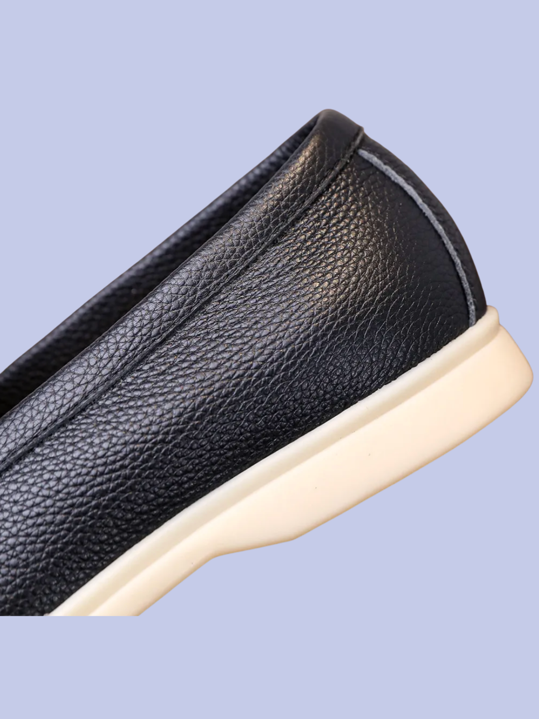 The back view of the black Pebbled Leather Slip-On Loafers