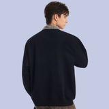 Back view of the midnight black Loose Fit Collared Mock Layer Sweater