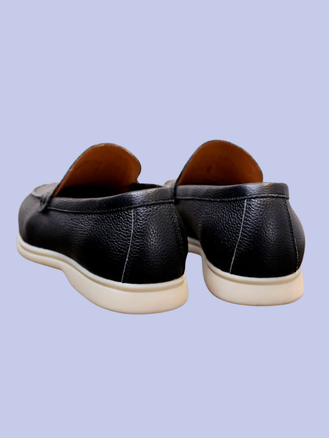 Both views of the back of the black Pebbled Leather Slip-On Loafers