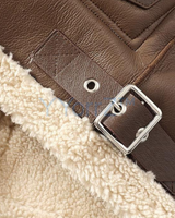 A close view of the belt of the Thick Vintage Faux Leather Curly Shearling Lining Jacket