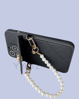The Crossbody Quilted iPhone Wallet Case with Pearl Chain Strap in landscape view.