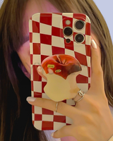 Left hand grip of the Red Checkered iPhone Case with Apple Stand Grip 
