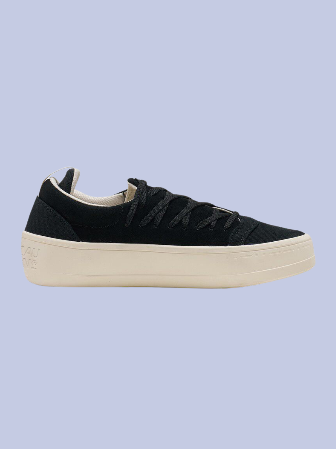 The left side view of the left pair of the Unisex Minimalist Laced Low-Top Canvas Sneaker