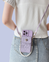 The purple Crossbody Quilted iPhone Wallet Case with Pearl Chain Strap