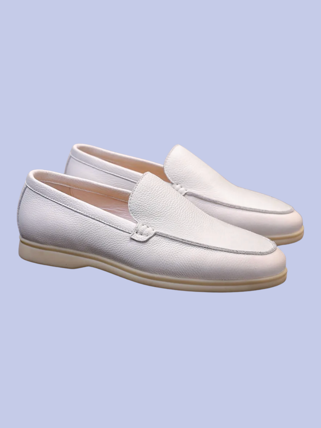 The side view of the white Pebbled Leather Slip-On Loafers