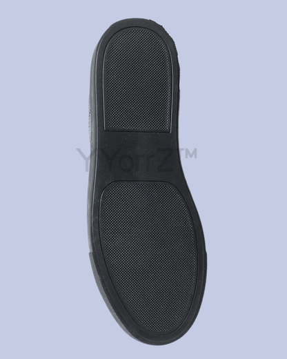 The sole of the Black Triple Stitch Slip-On Low-Top Sneakers