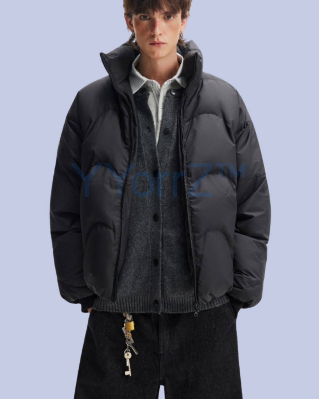 A model wearing an Unbuttoned Jet Black Stand Collar Thick Quilted Puffer Jacket